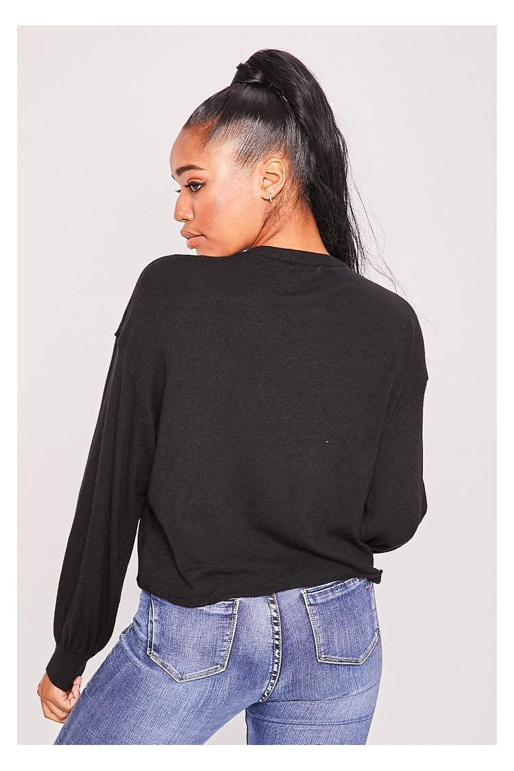 Pull noir tête de femme