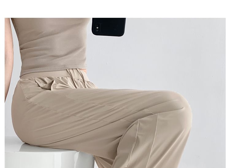 Shira - Koelere joggingbroek met wijde pijpen en split