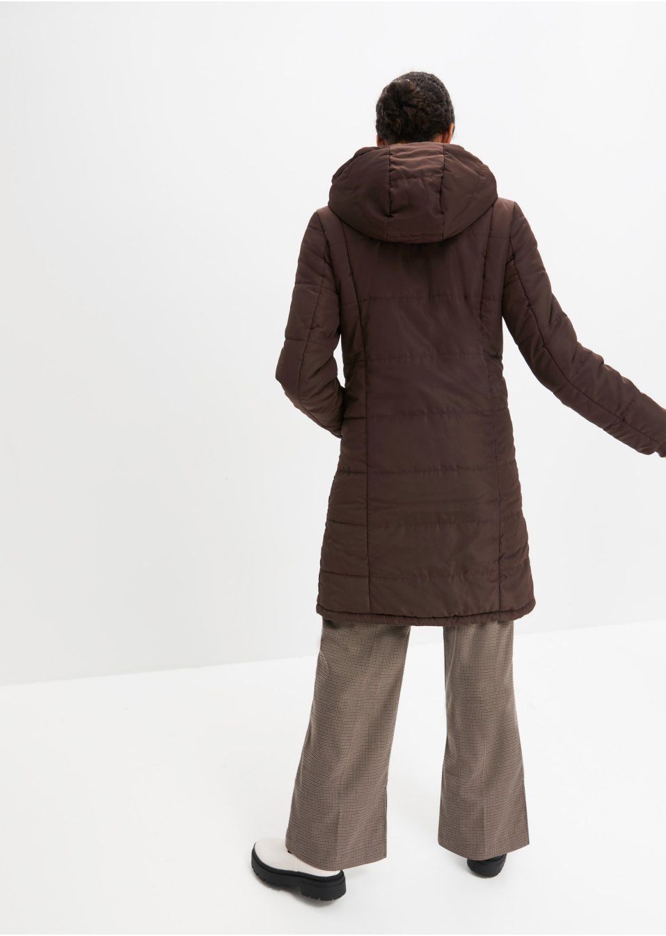 Manteau matelassé avec zip asymétrique