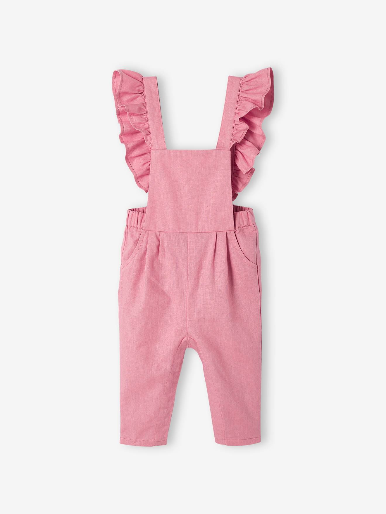 Jardineira infantil rosa em linho e algodão com babado.