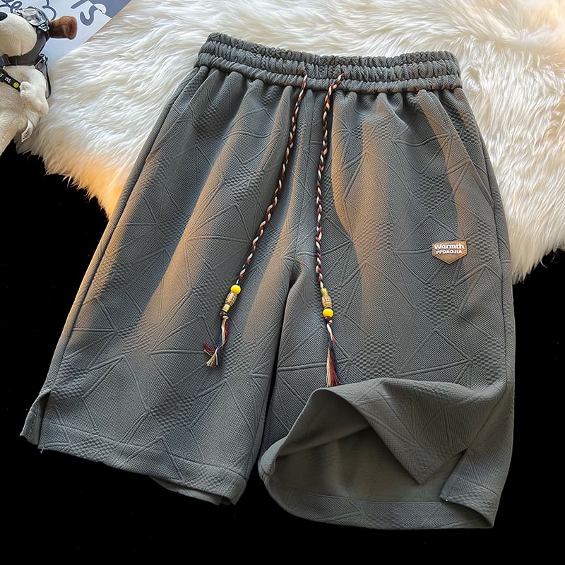 Derbundy - Trekkoord taille letters applicatie split sweat shorts
