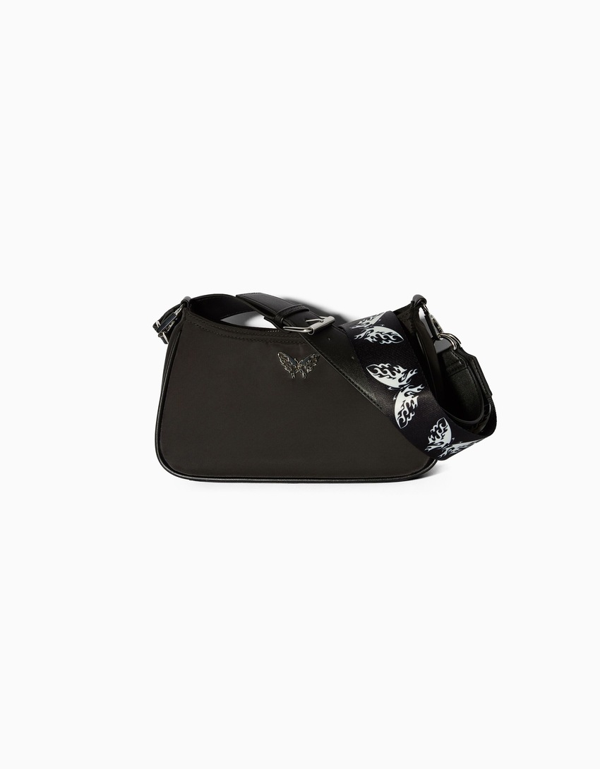 Bolsa transversal com detalhe de borboleta