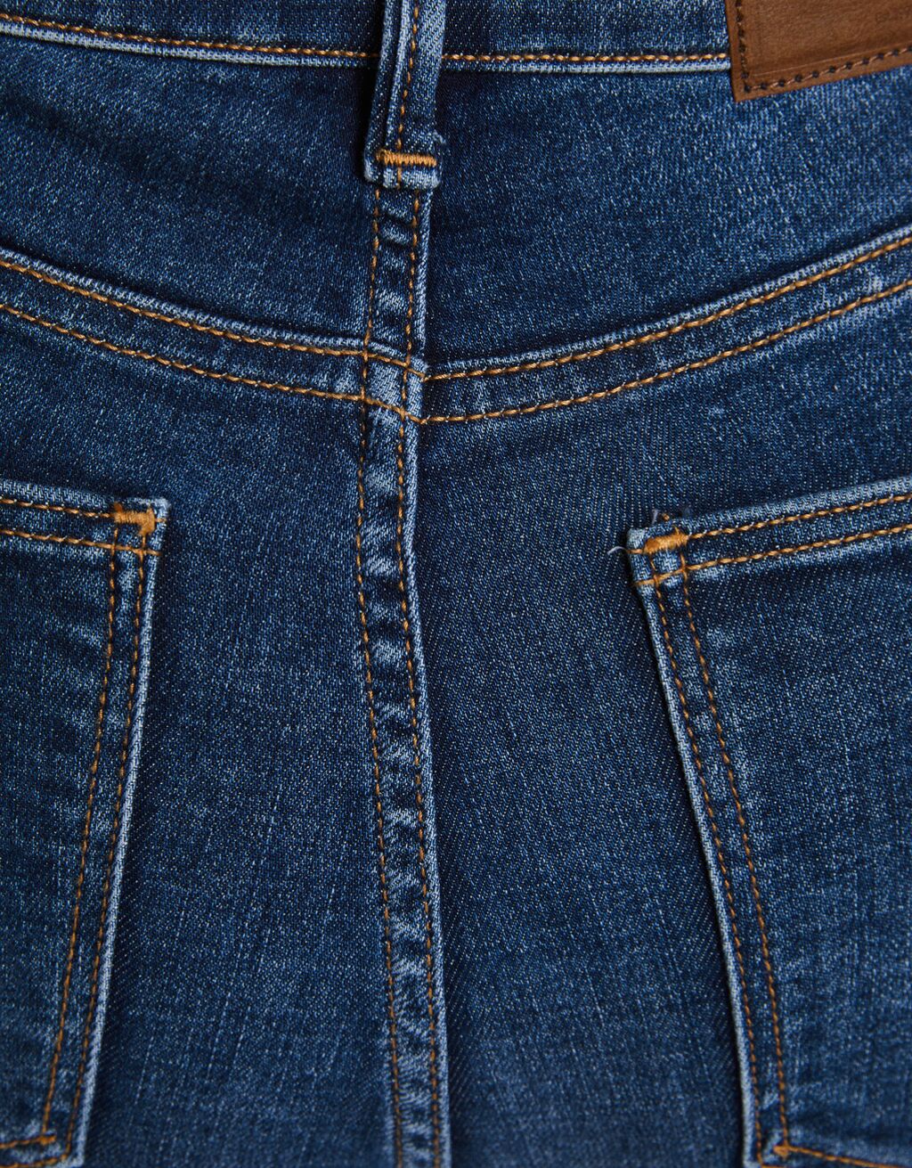 calça jeans skinny de cintura super alta