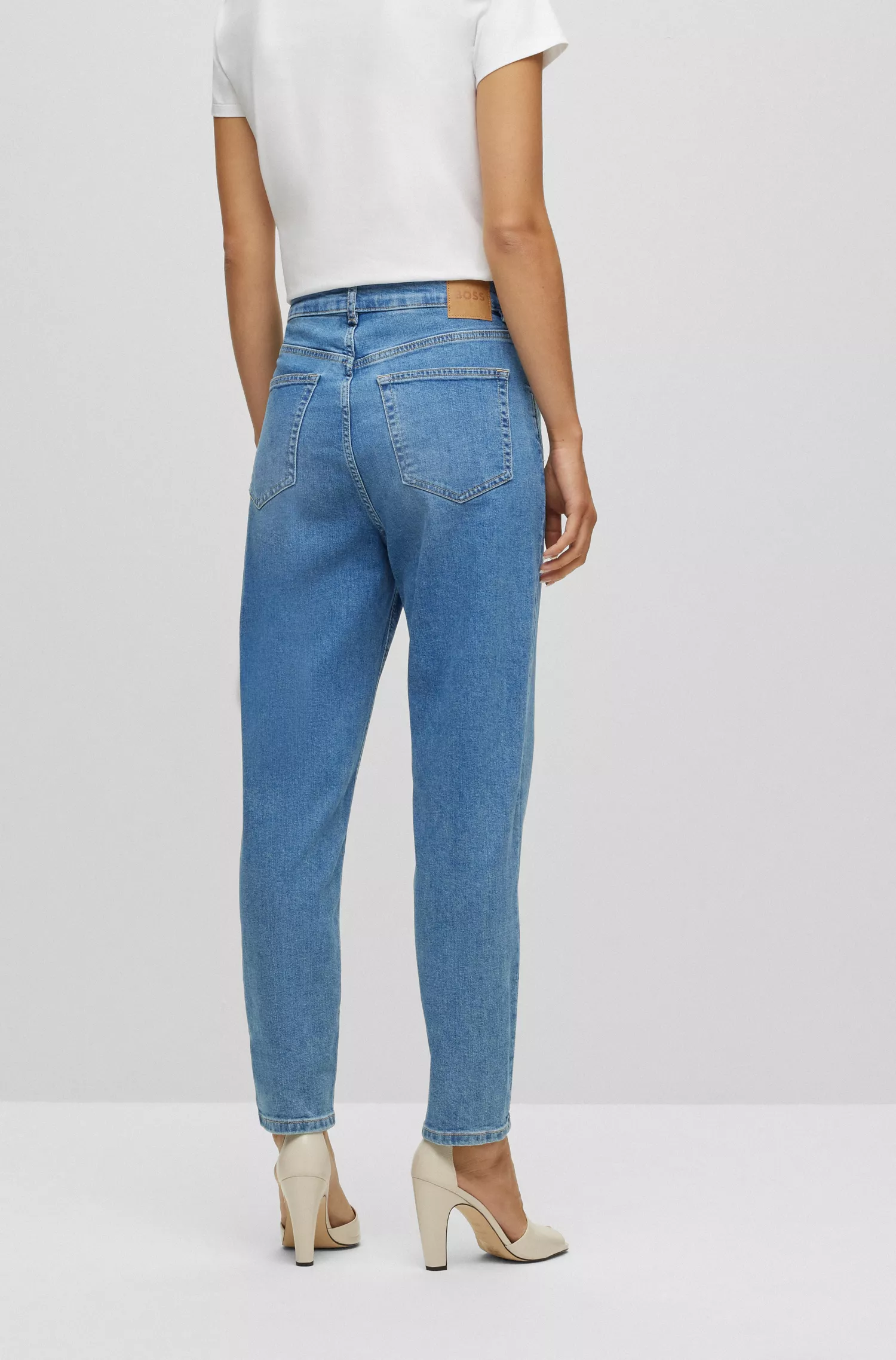 Calça jeans cropped de cintura alta BOSS preta em denim azul confortável com elasticidade.