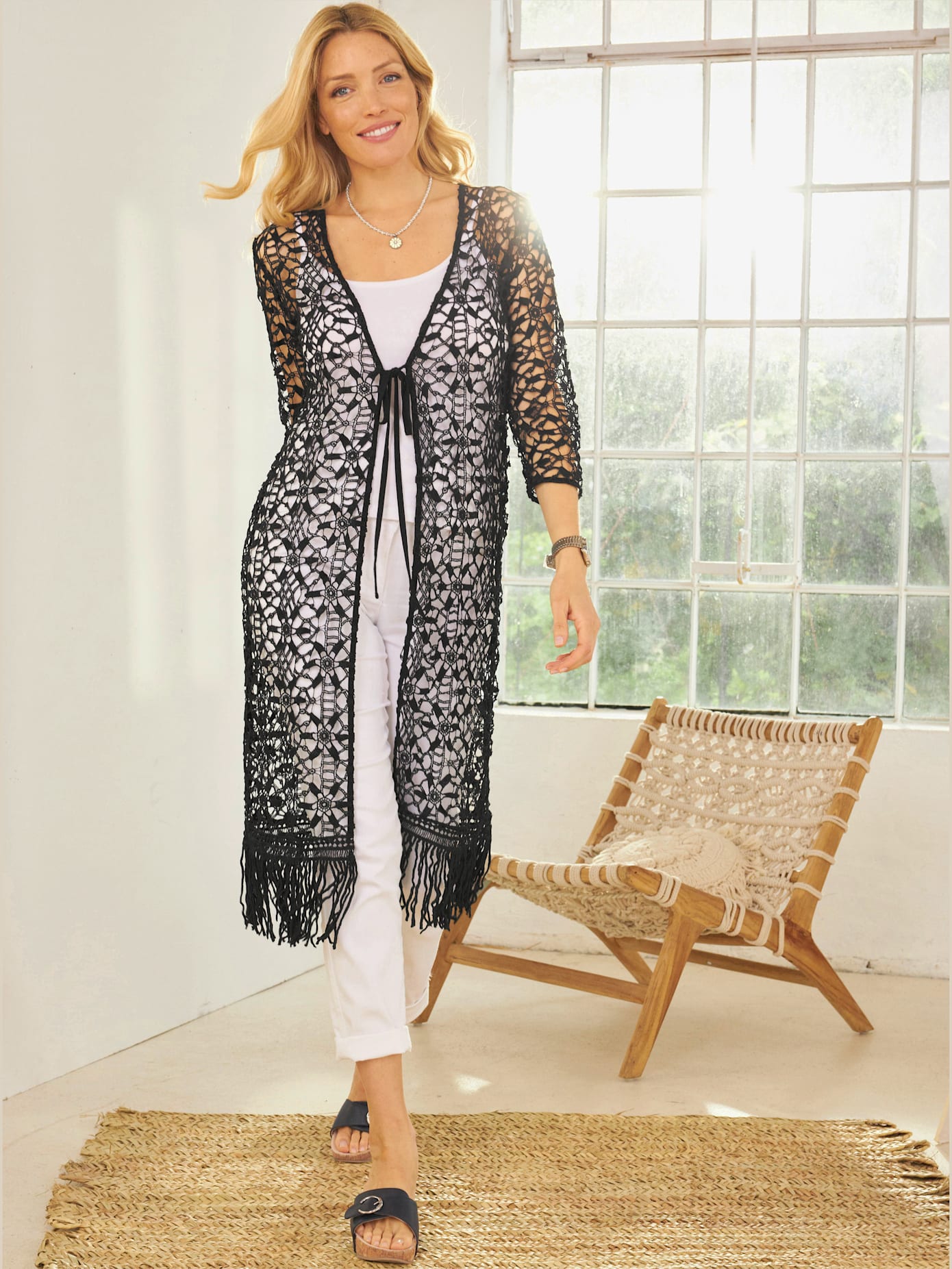Manteau en tricot aspect crochet