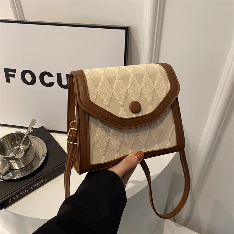 Basaran - Crossbodytas met contrasterende rand en klep