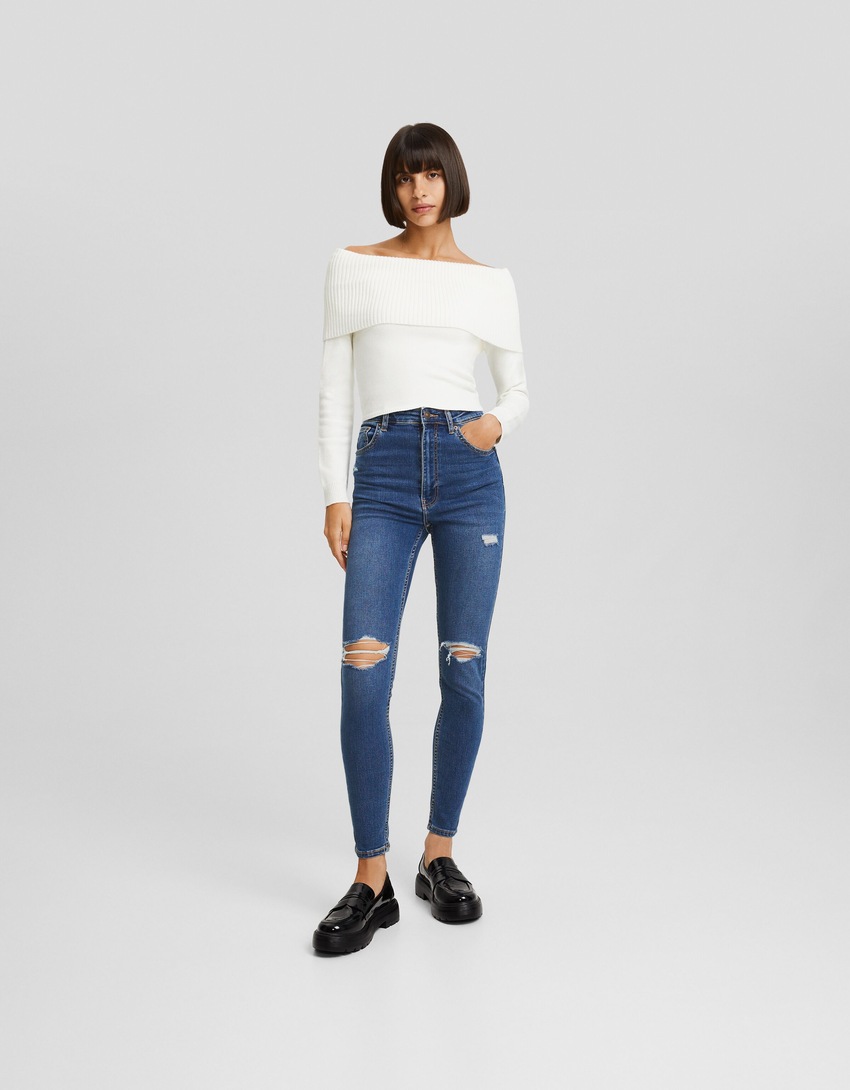Calça jeans skinny de cintura super alta e rasgada
