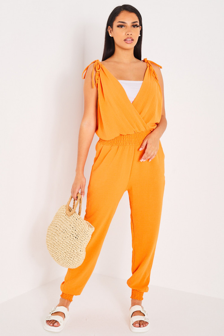 Combinaison pantalon orange fluide à manches noué
