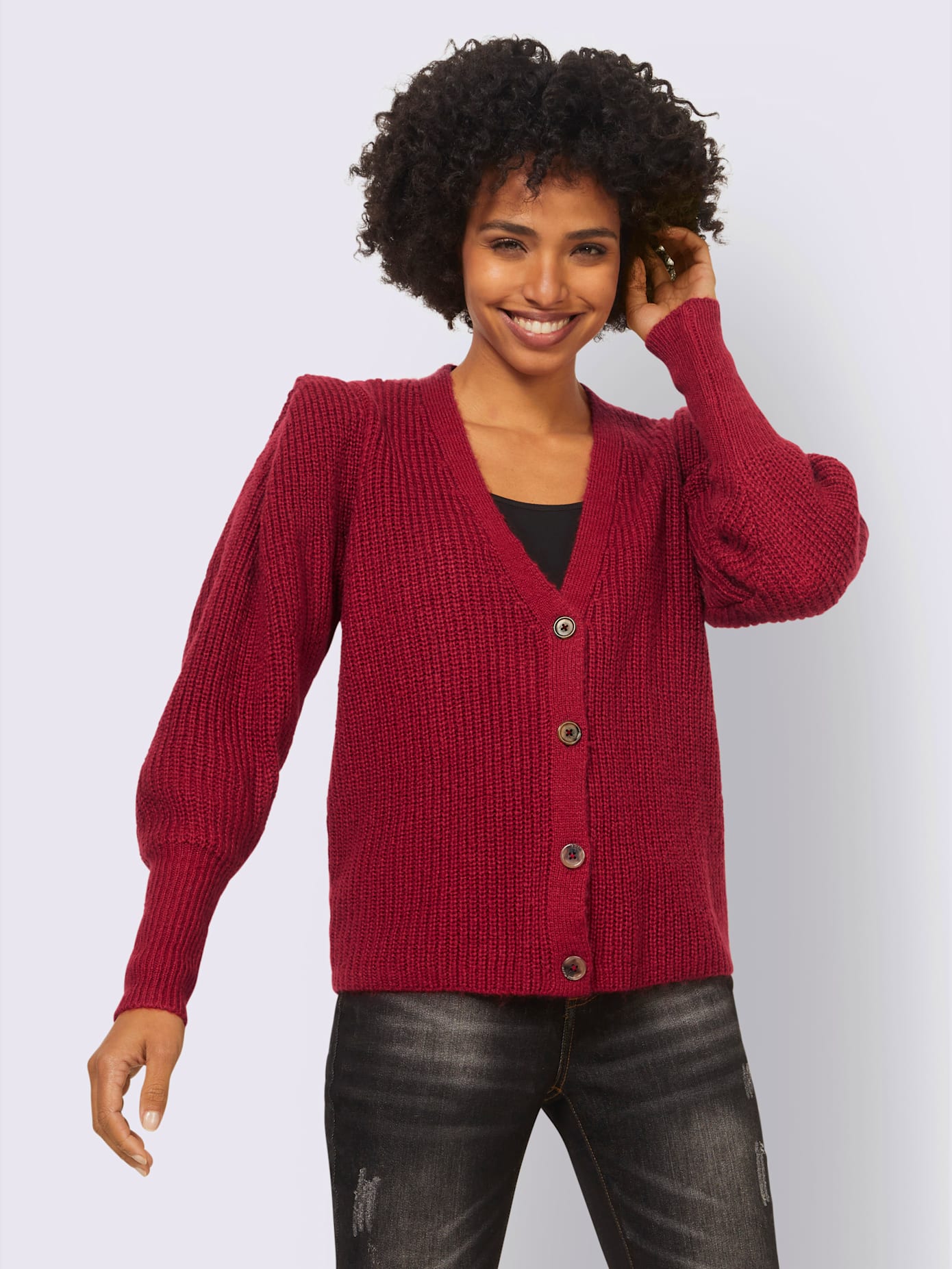 Veste en tricot manches extravagantes