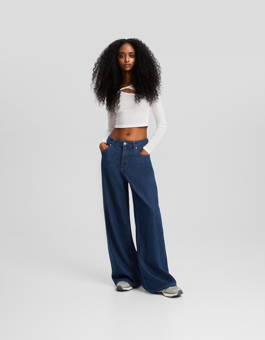 calça jeans de perna larga