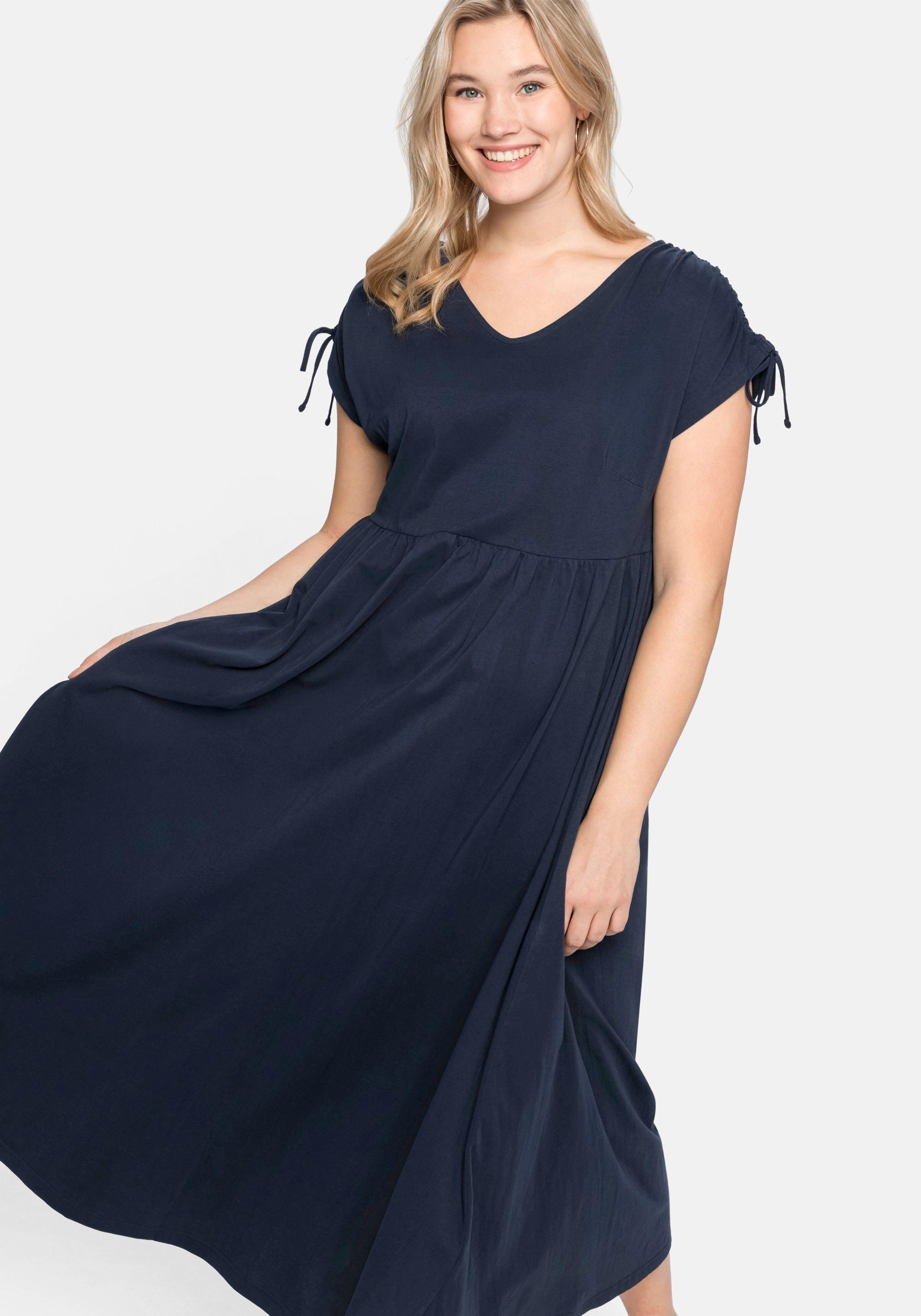Jerseykleid mit weitem Rock und V-Ausschnitt