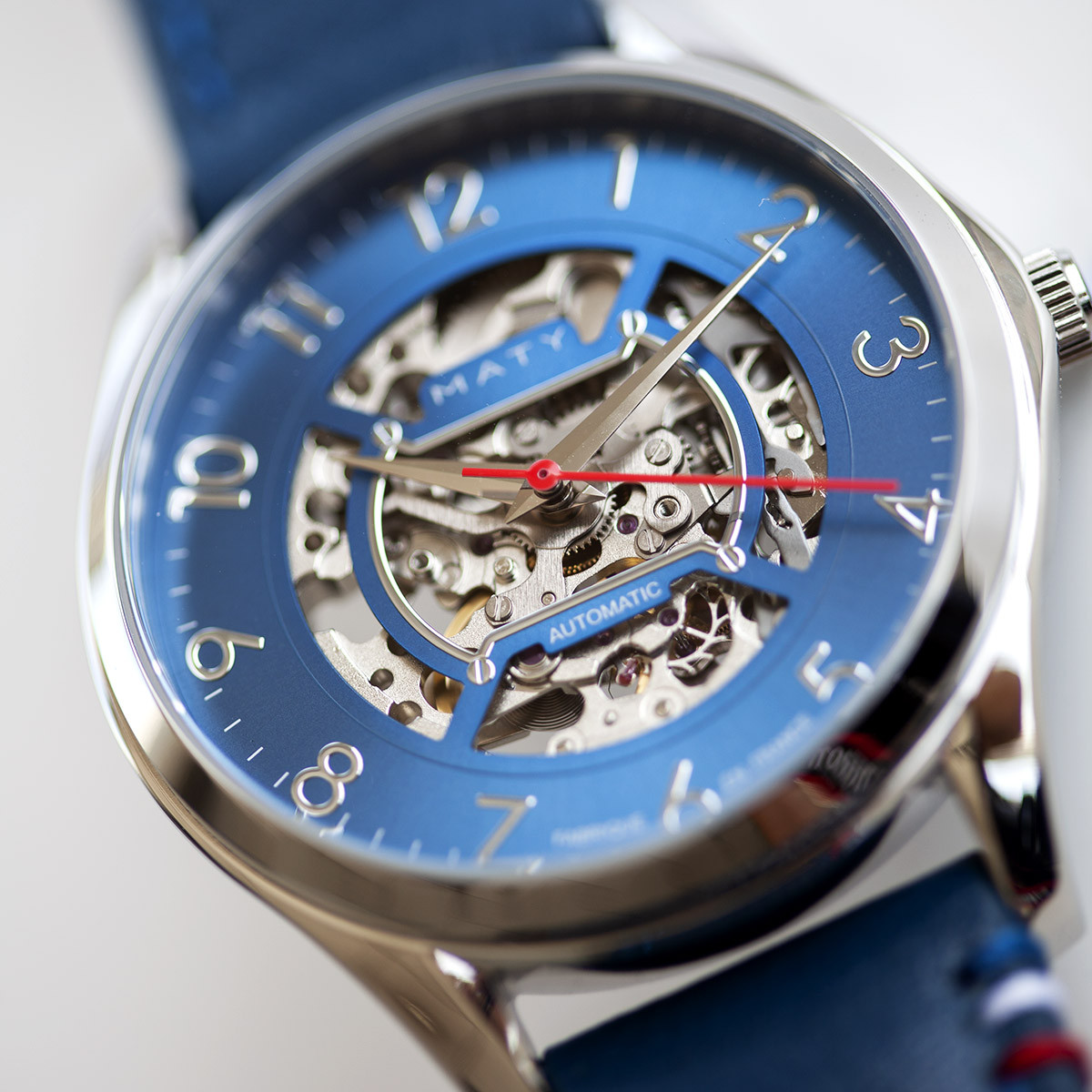 Montre homme squelette automatique acier bracelet cuir bleu