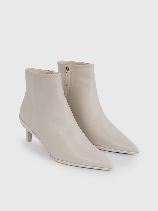botas de couro até o tornozelo