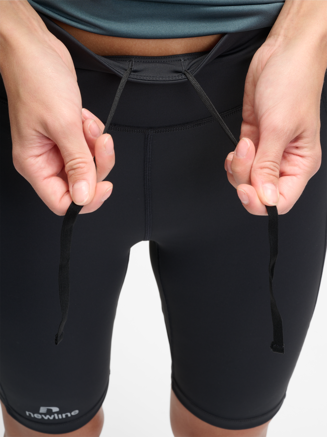 nwlRACE HW POCKET TIGHT SHORTS W