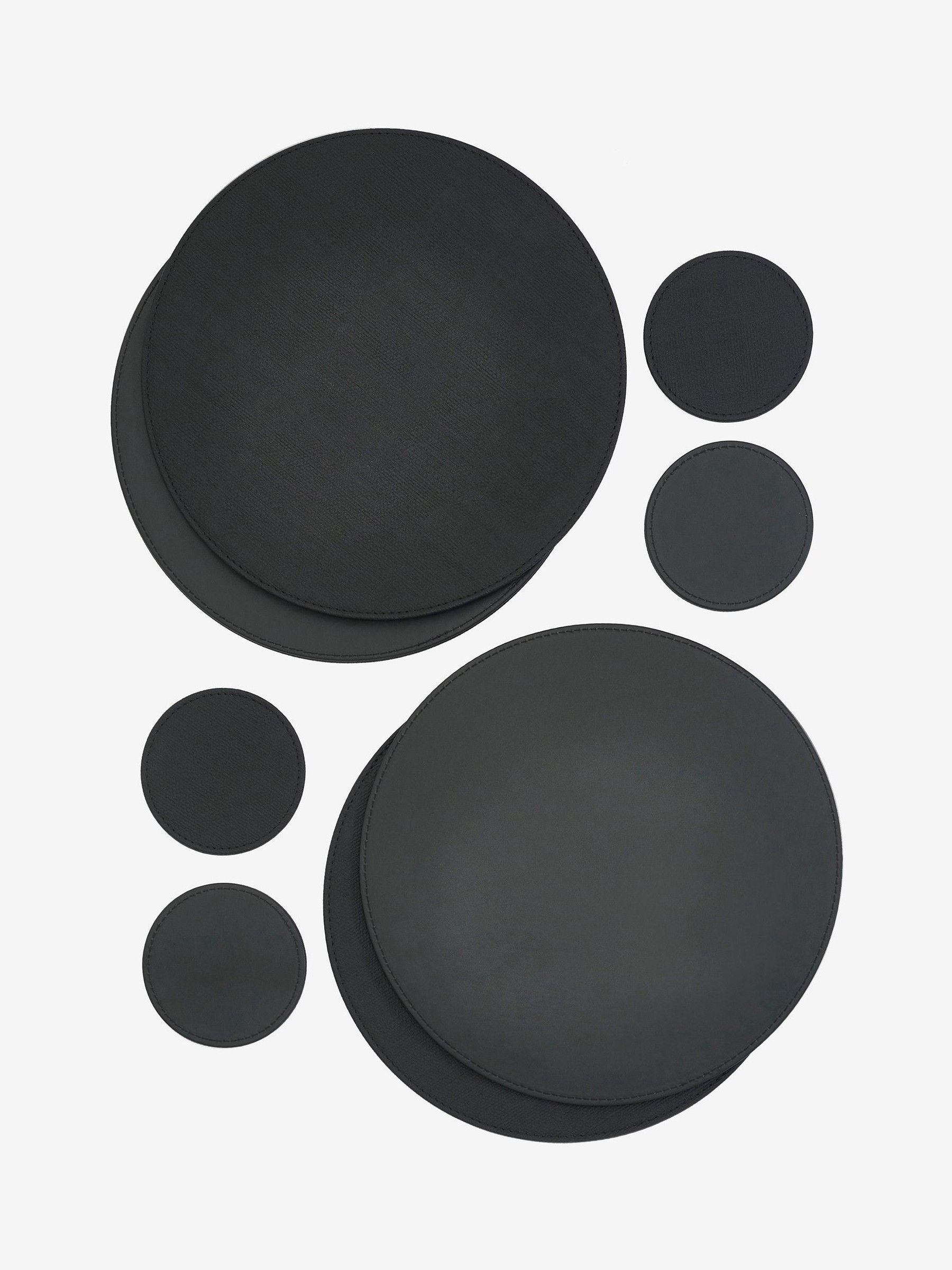 Set van 4 omkeerbare placemats en onderzetters van imitatieleer