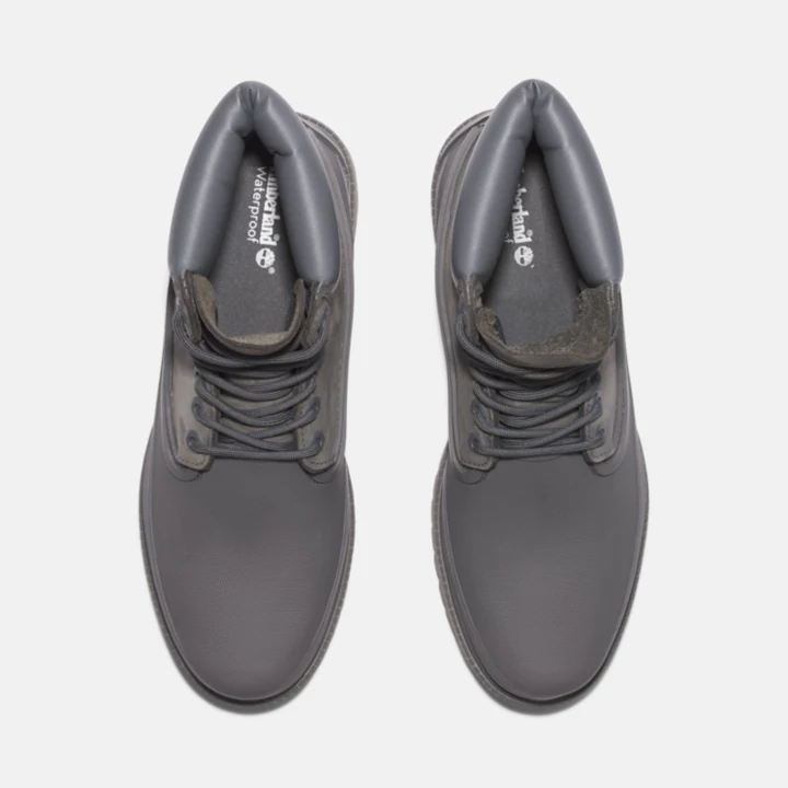 Bota Timberland Heritage de 6 polegadas com biqueira de borracha para homem, na cor cinza.