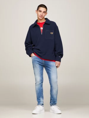 Calça jeans slim fit afunilada e desbotada