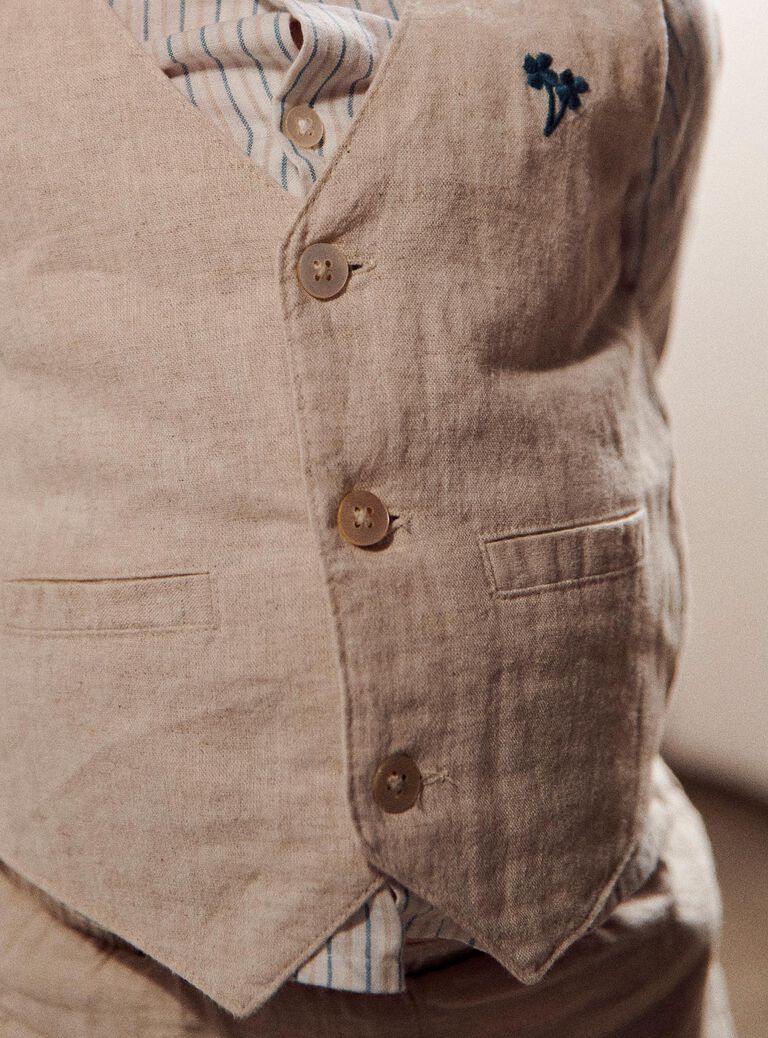 Veste beige sans manches en lin