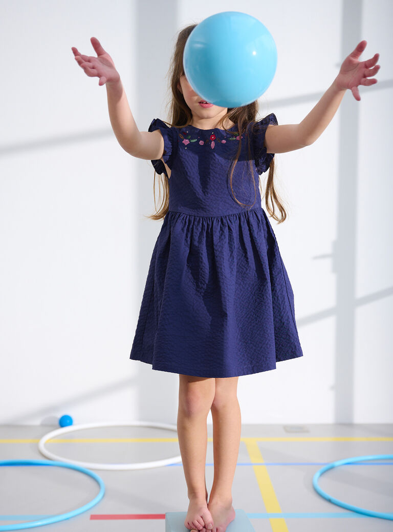 Robe bleu foncé avec sequins et dos échancré pour fille