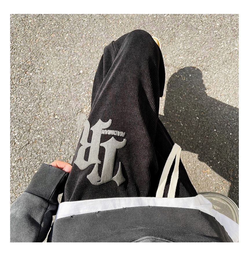 FOEV - Joggingbroek met trekkoord en letters