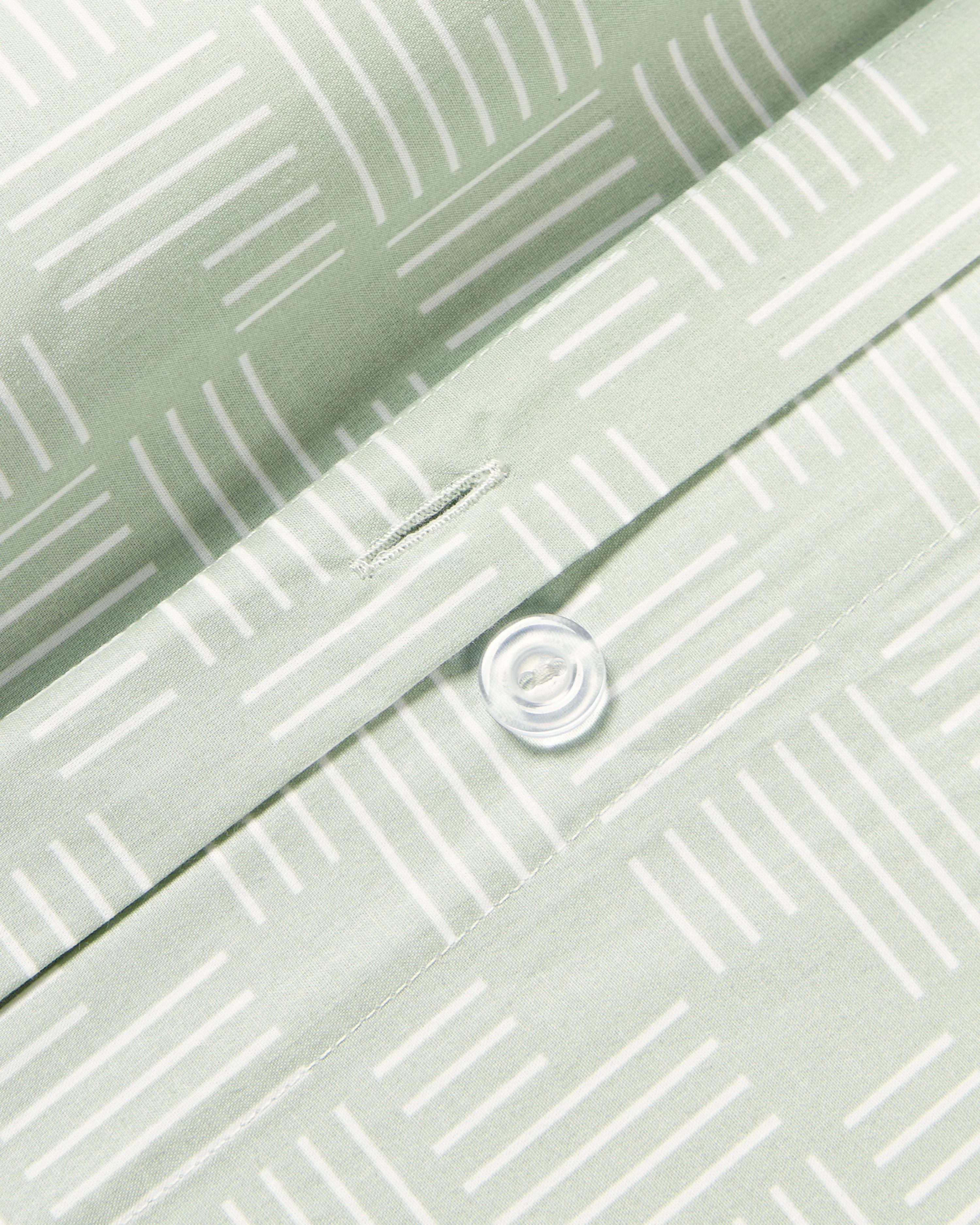 Katoenen perkal kussenhoes Inki met geometrische print