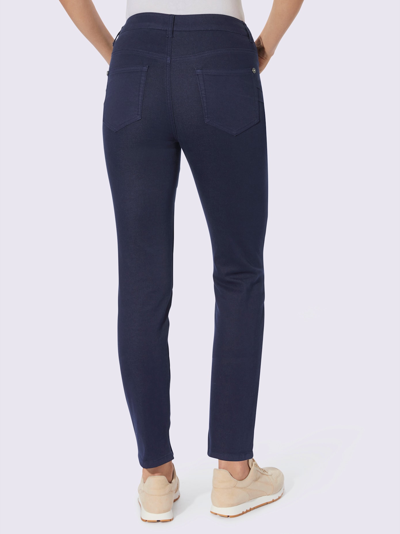 Jean push-up rivets sur les poches
