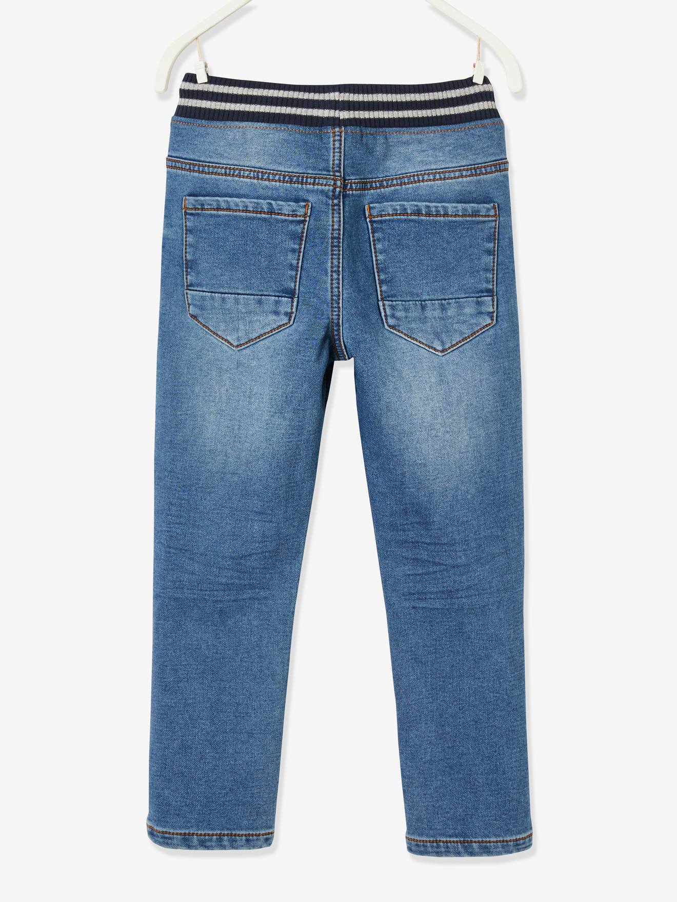 Calças de lã com efeito jeans e interior azul escuro e aconchegante.