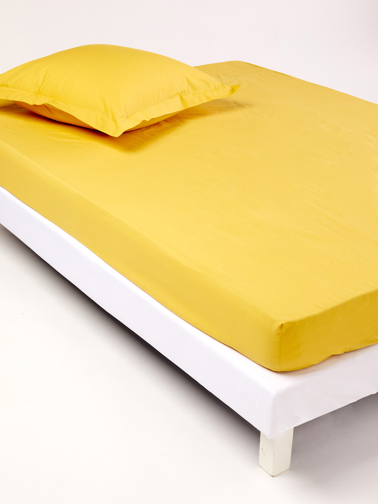 Drap-housse en pur coton bonnets 25cm