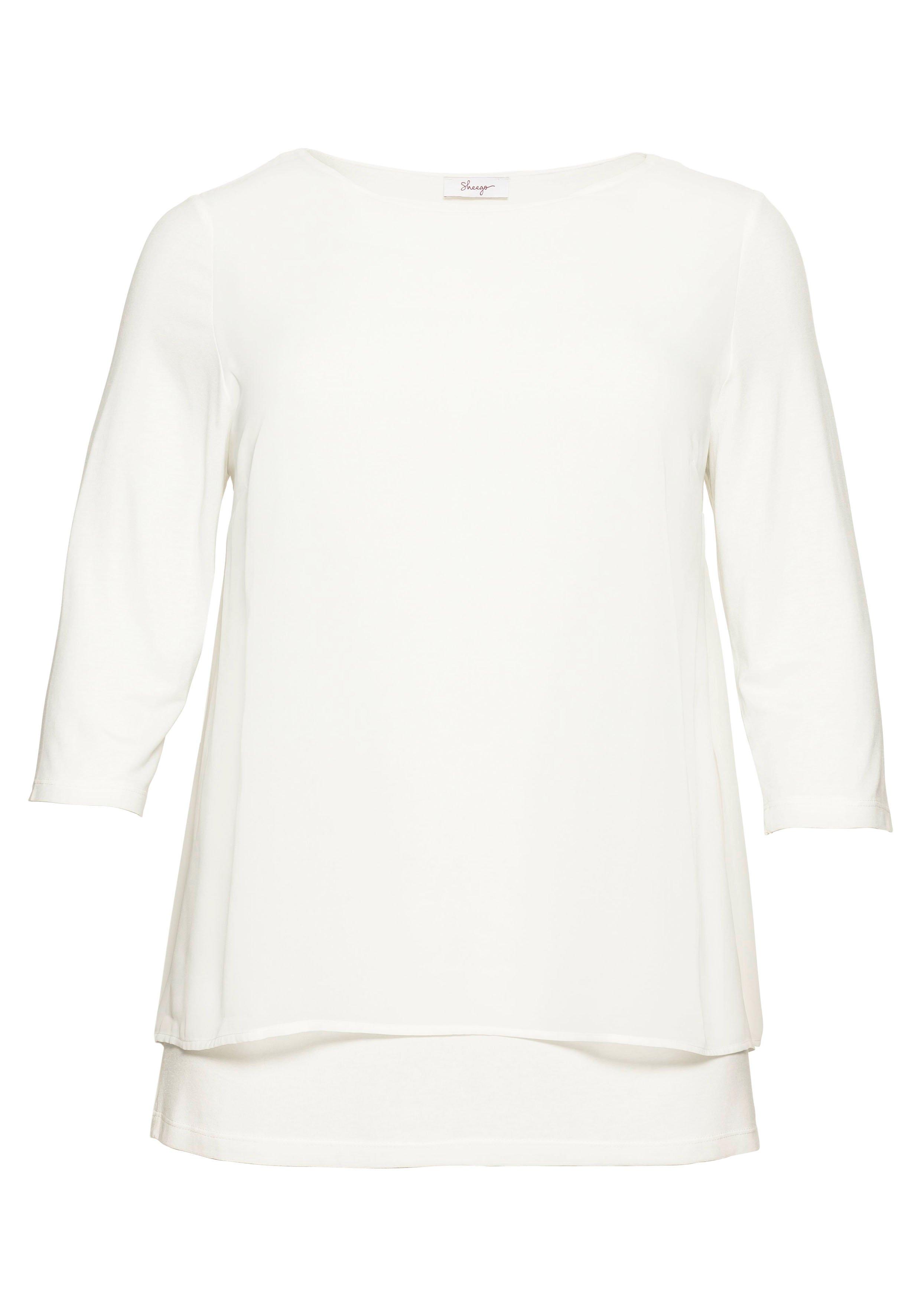 Blusenshirt in leichter A-Linie mit Zipfelsaum