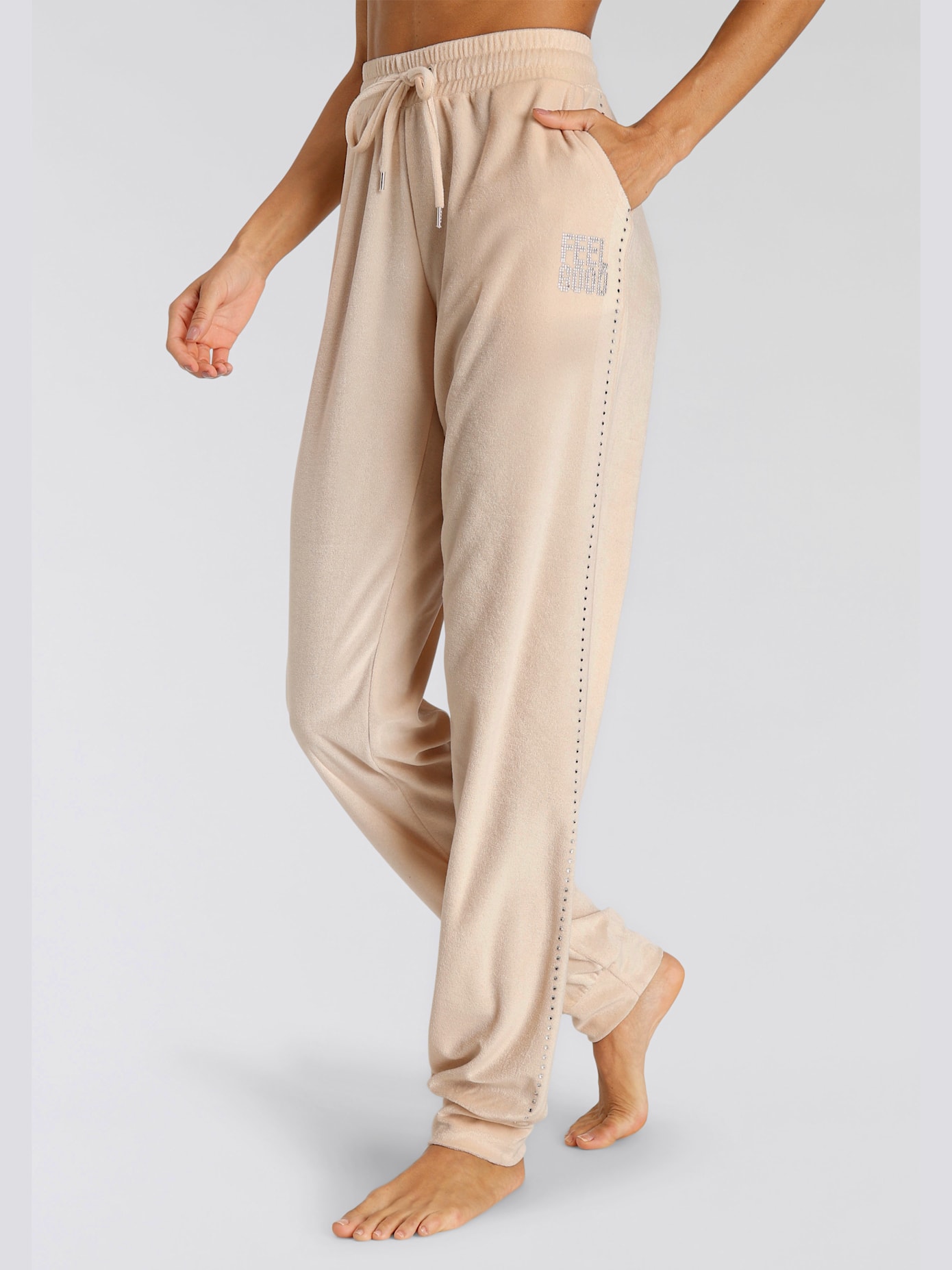 Pantalon en velours ras à la coupe étroite