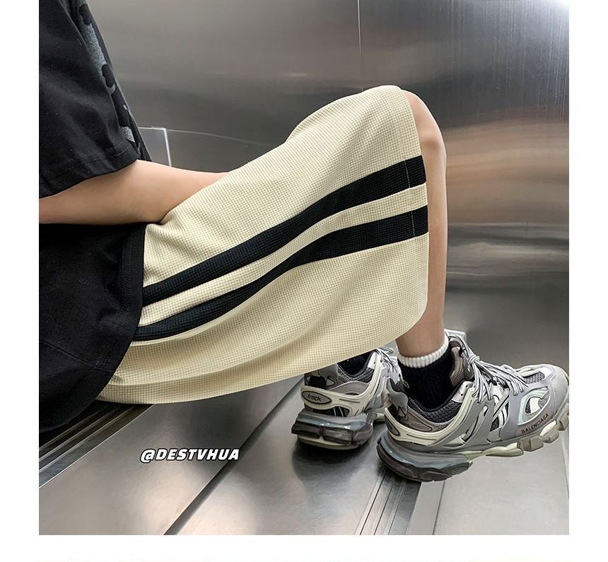POSI - Gestreepte losse joggingbroek met trekkoordtaille