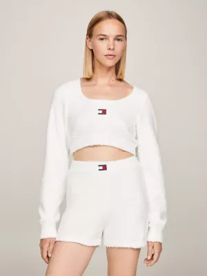 Blusa cropped com decote baixo e emblema