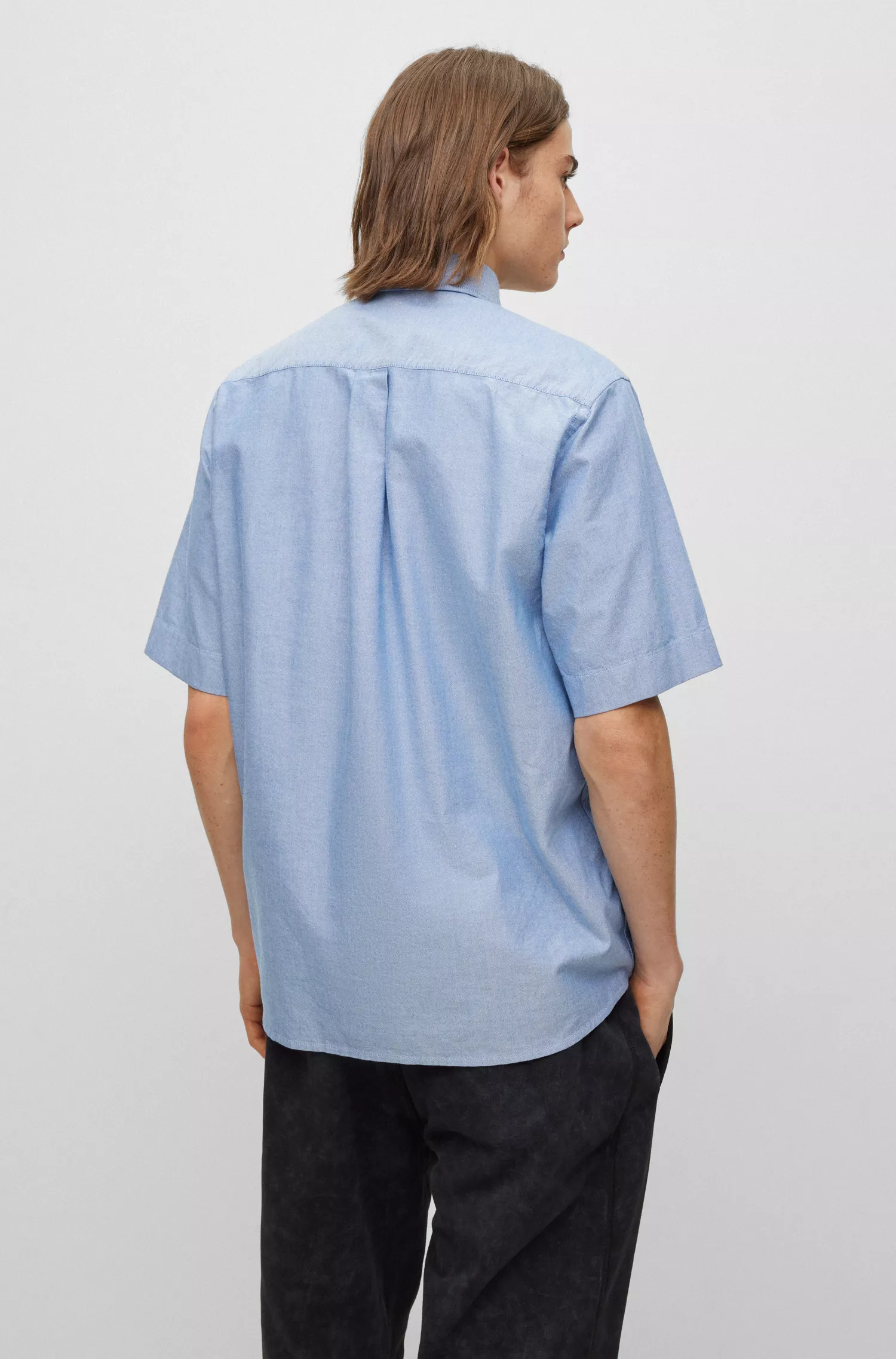 Camisa BOSS laranja de modelagem relaxada em algodão com detalhes inspirados em corridas.