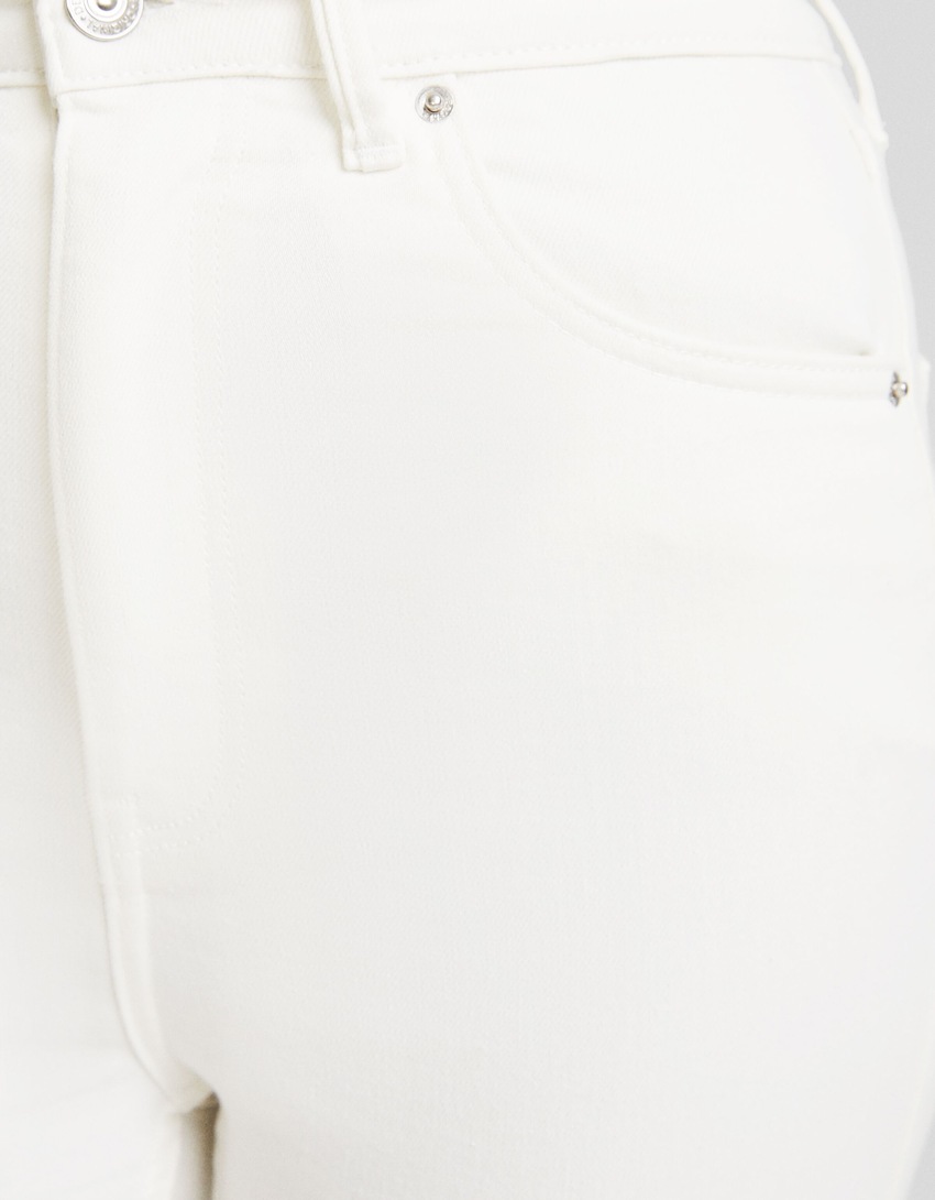 calça jeans skinny de cintura super alta