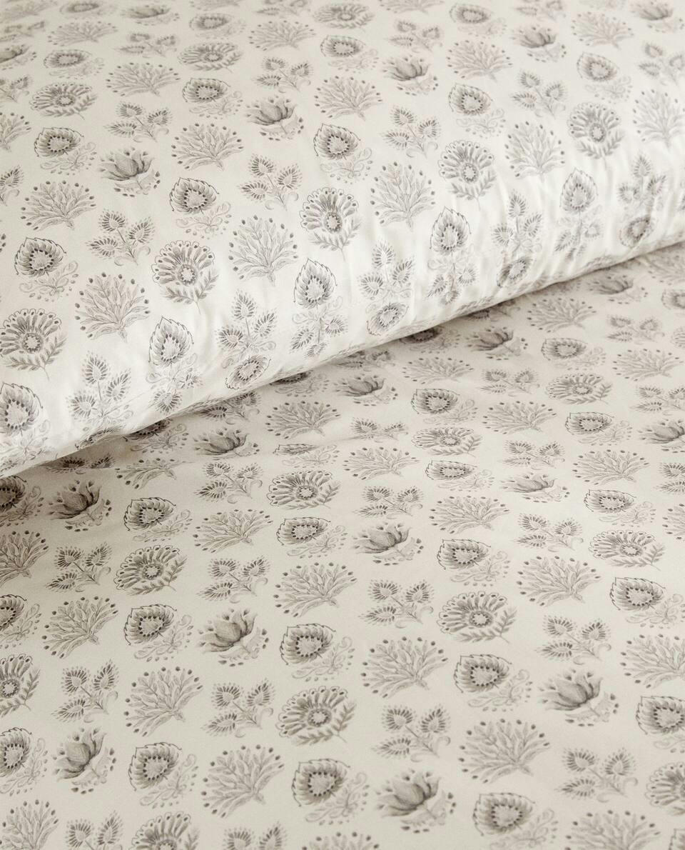 CAPA DE EDREDOM COM ESTAMPA DE FOLHAS
