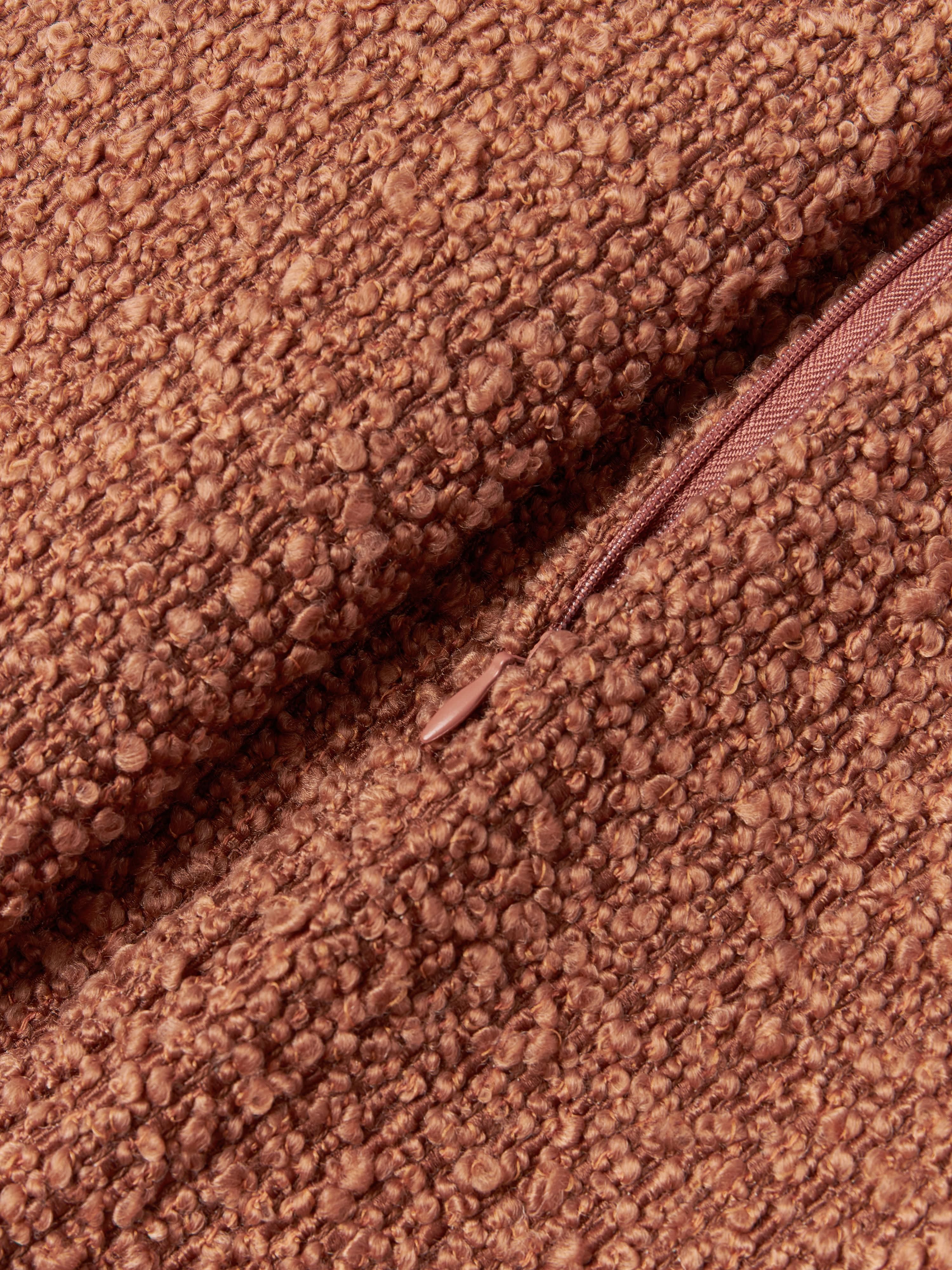 Bouclé kussenhoes Bellamie