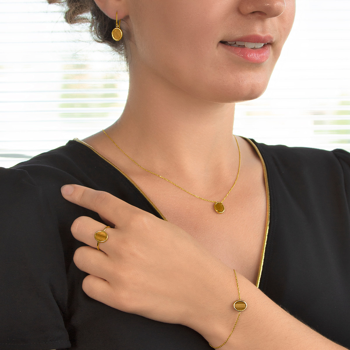 Collier or 750 jaune oeil de tigre ovale 45 cm