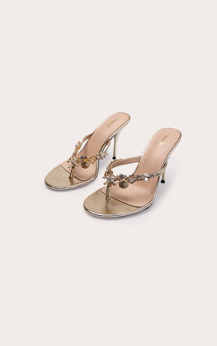 Doré Mules À Talons Avec Bride Orteil Et Ornement Charm