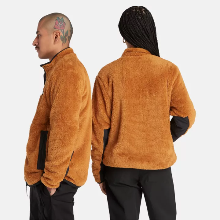 Jaqueta de lã polar de pelo alto, unissex, na cor laranja.