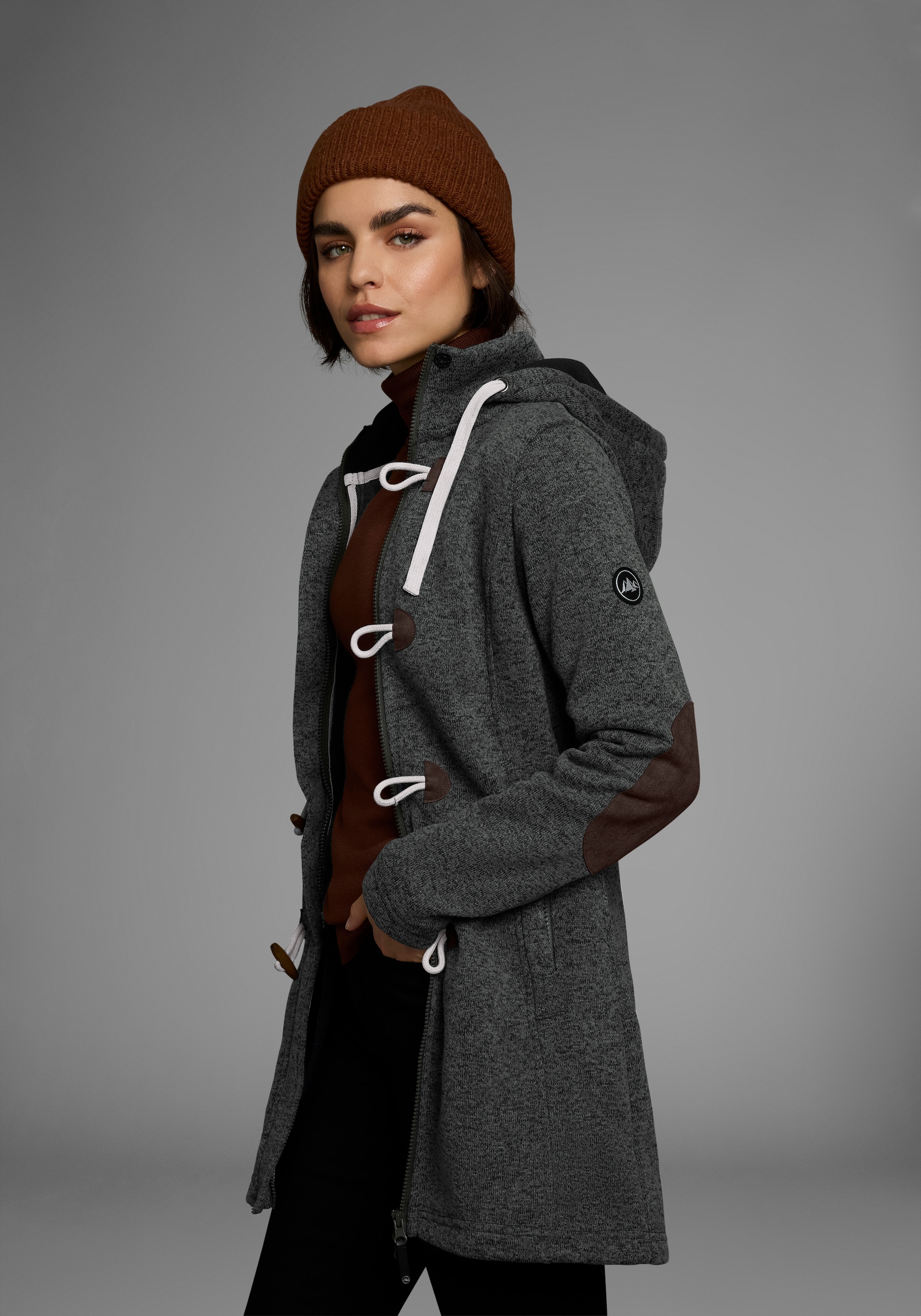 Polarino Strickfleecejacke mit Kapuze für den Übergang,  aus Strickfleece,  atmungsaktiv