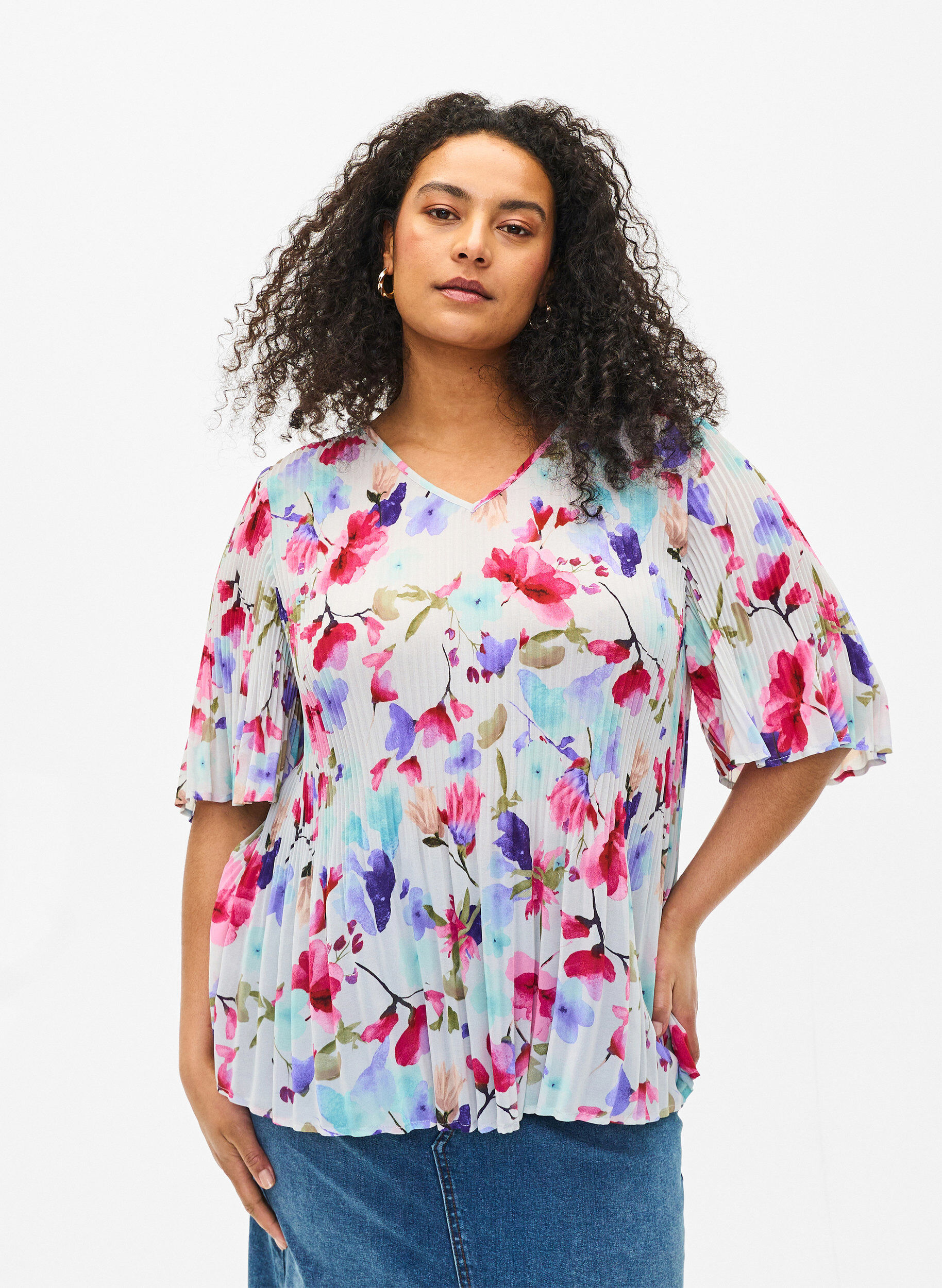 Blomstret bluse i plissé
