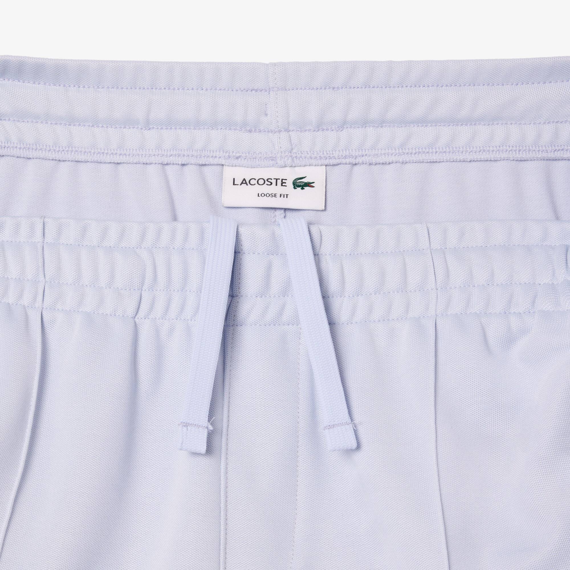 Trainingshose im lockeren Schnitt aus Interlock Trainingshosen - Blau - Lacoste - Herren