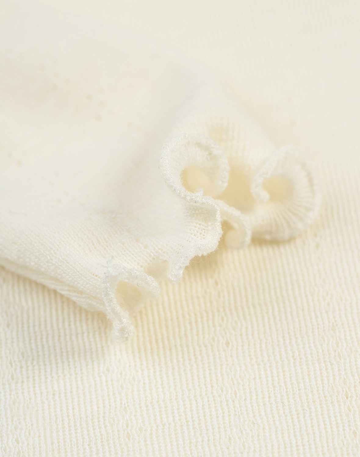 Pointelle romper met lange mouw van merinowol/zijde voor baby's