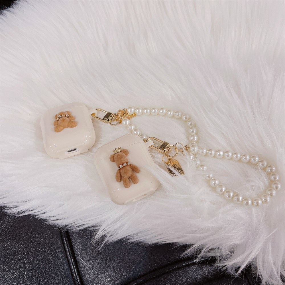 AirPods (1. & 2. Generation) Gummi Case Schutzhülle mit Handschlaufe Bär mit Krone Design - Beige
