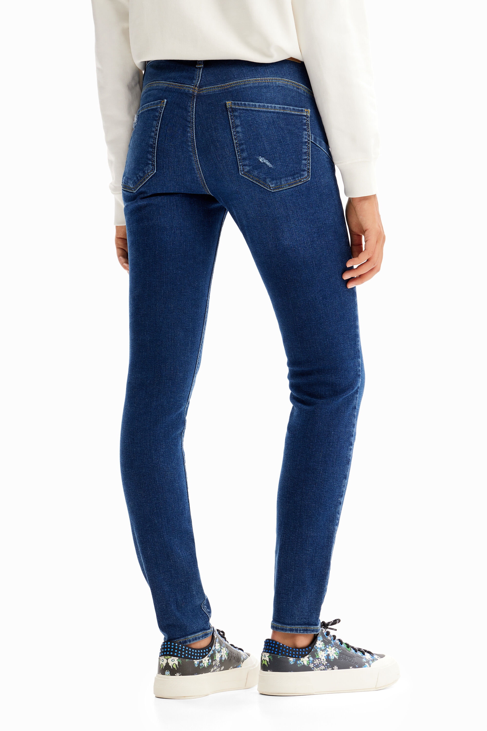 Calça jeans skinny push-up bordada