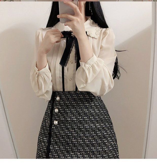 minaga - Blouse met lange mouwen en gestrikte hals