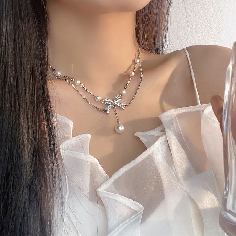 Milkieway - Nepparelketting met strass-strik