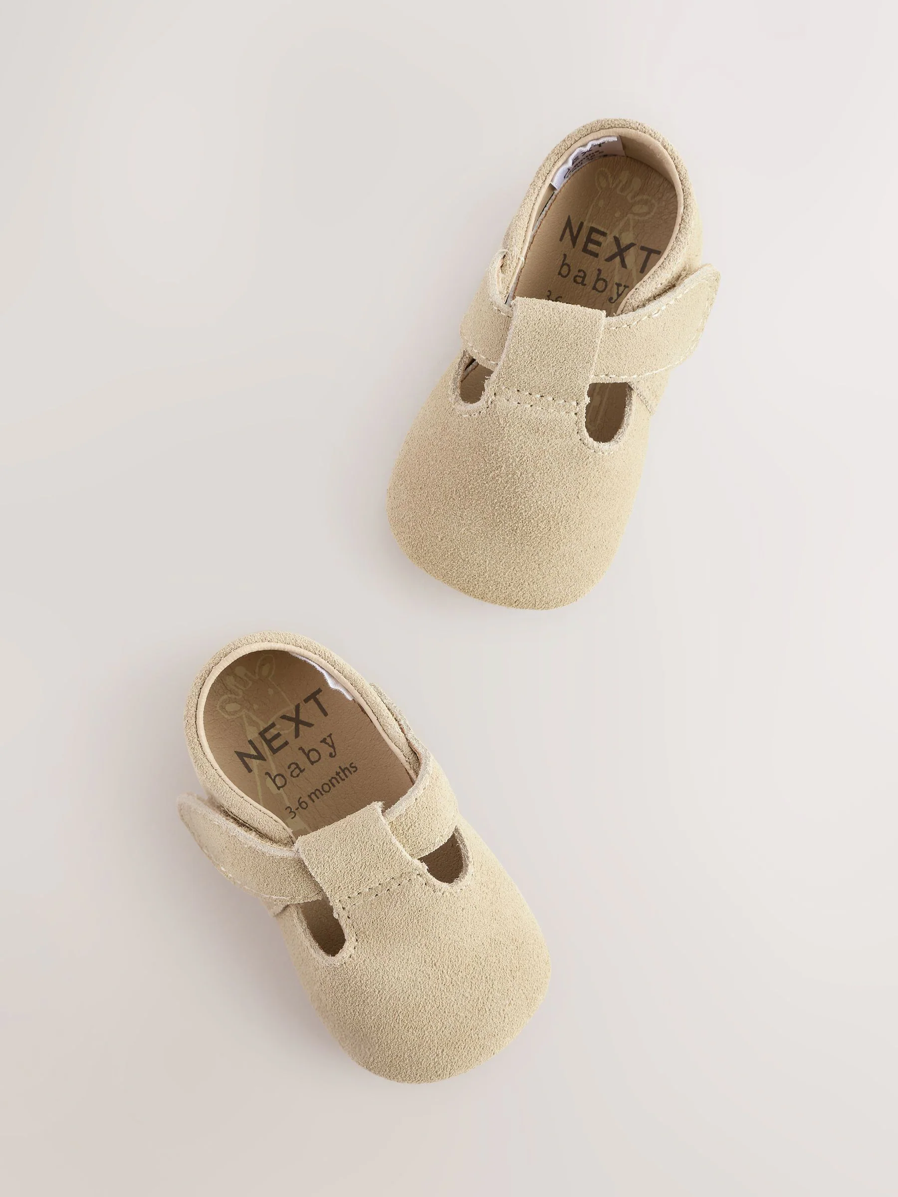 Kiezelkleurig suède - Leren babyschoen met T-bandje (0 - 24 mnd)