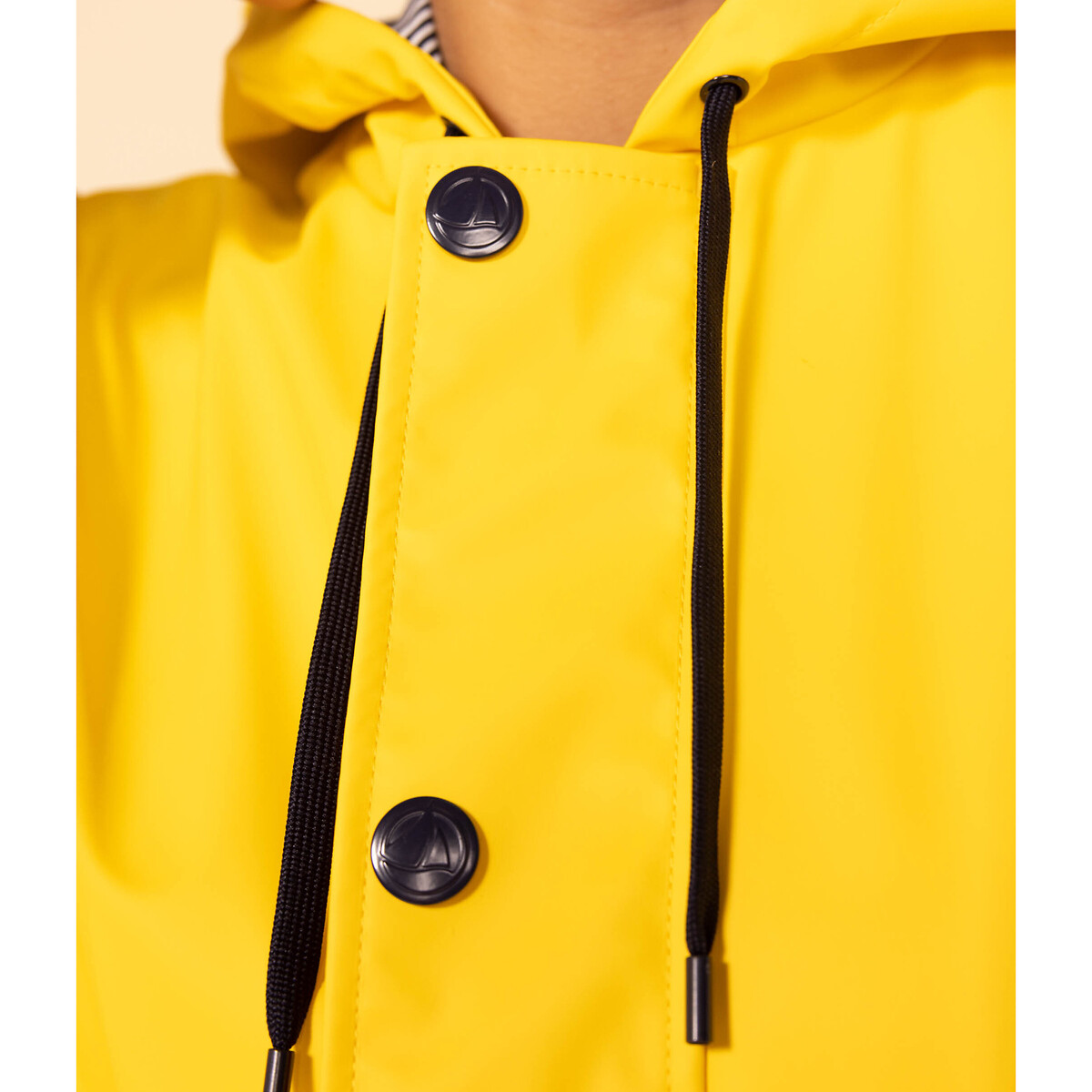 PEQUENO BARCO<br>Regenjas met kap, Iconique