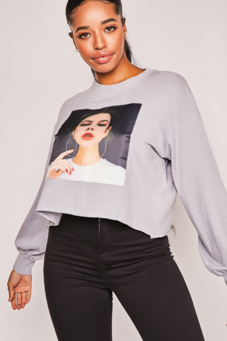 Pull gris tête de femme